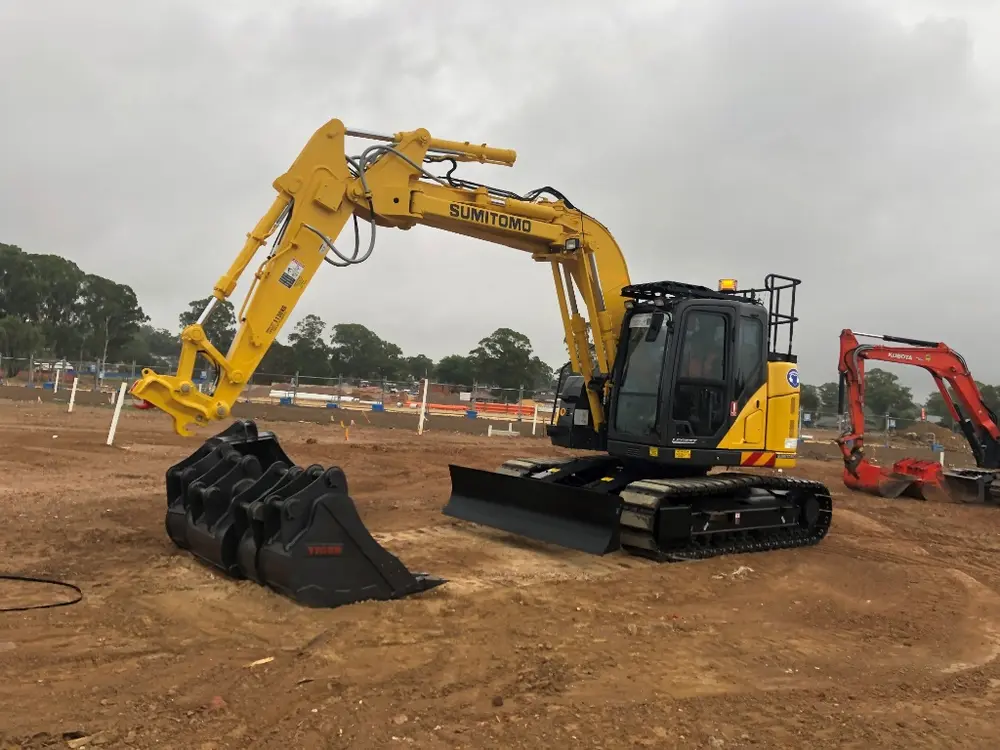 Mid-size excavator with tilt bucket